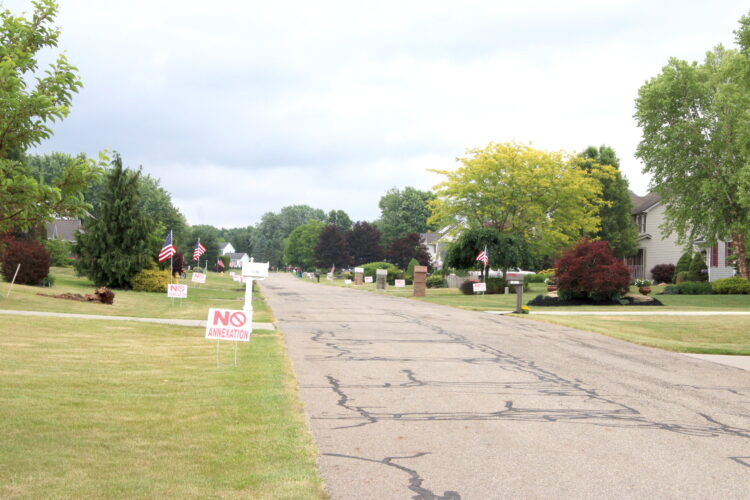 Perry residents, trustees rally against mandated annexation News